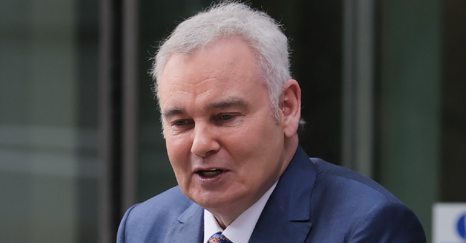 Eamonn Holmes mid-conversation outside studios