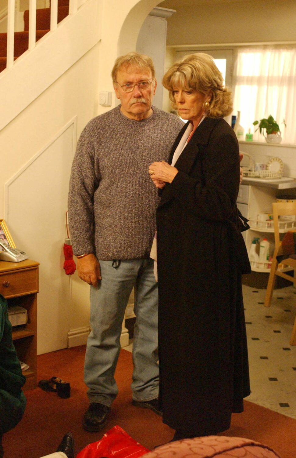Bill Webster and Audrey Roberts look concerned in the Platt's living room