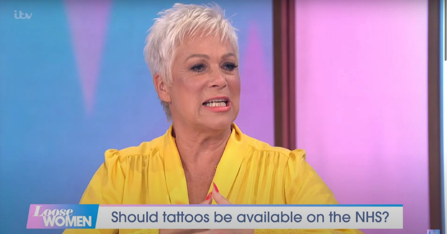 Denise Welch wearing yellow speaking on Loose Women today 
