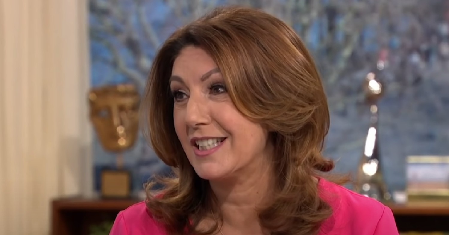 Jane McDonald smiling in pink top on Loose Women