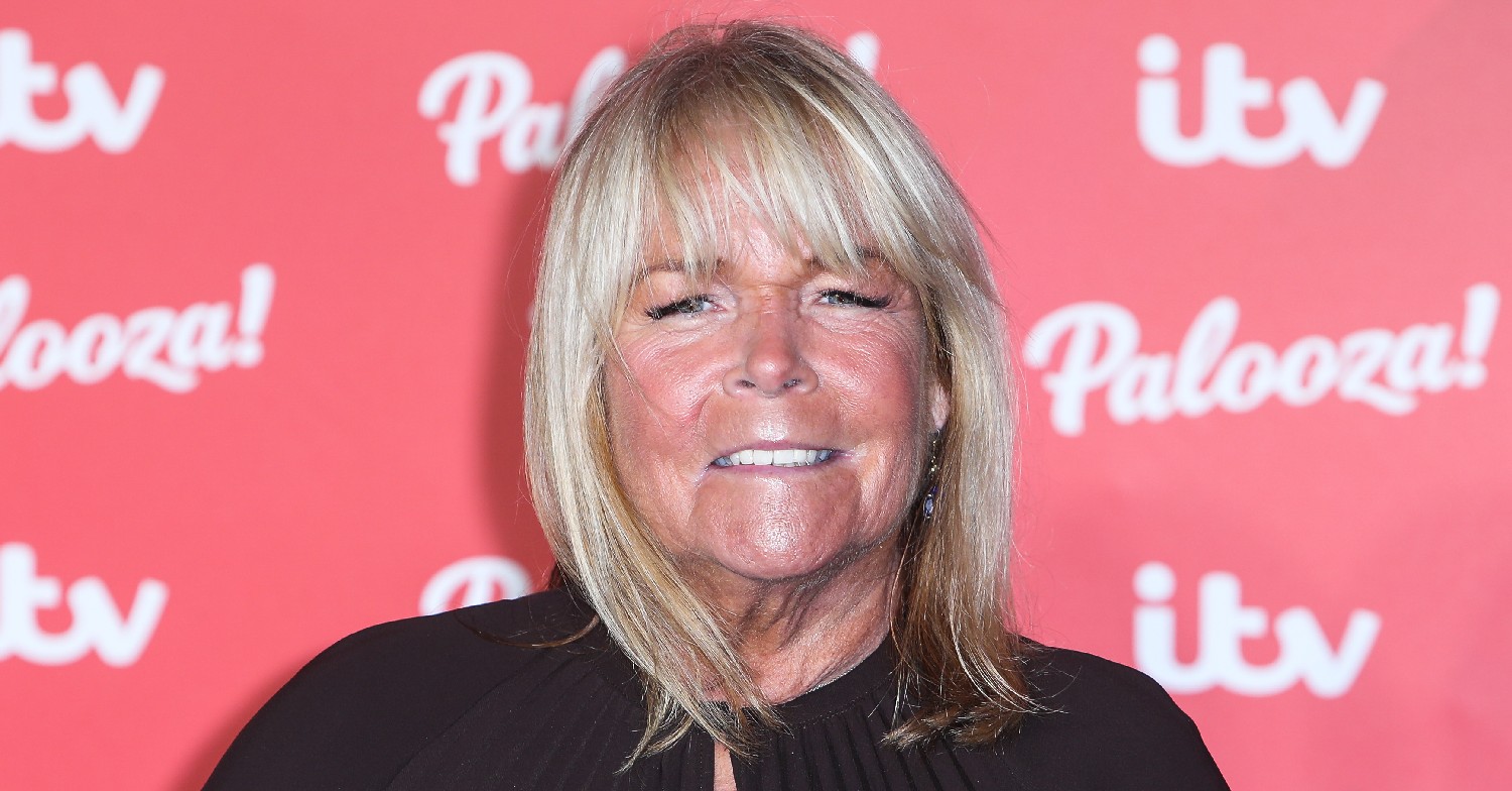 Linda Robson smiles on the red carpet 