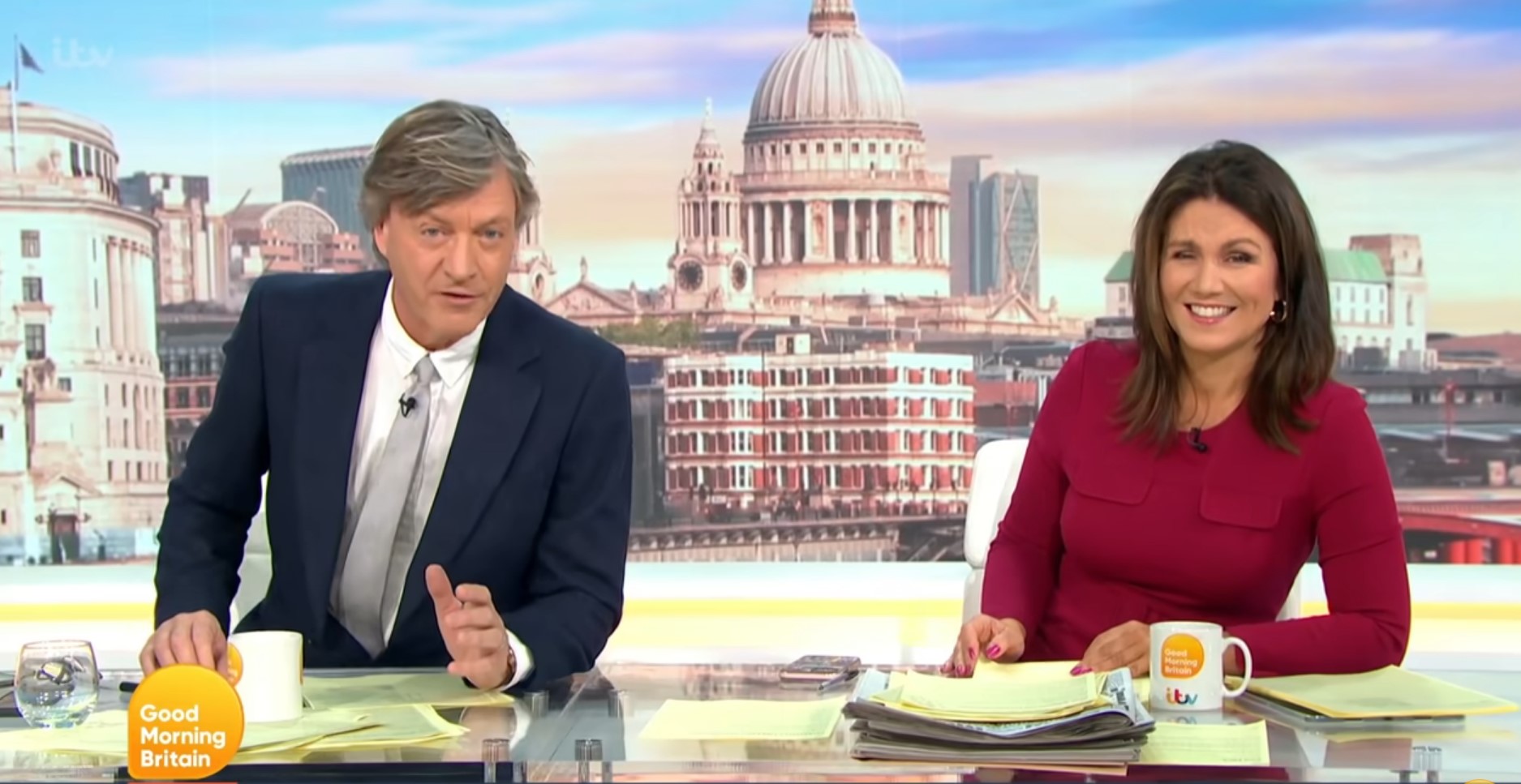 Richard Madeley presents alongside smiling Susanna Reid on GMB