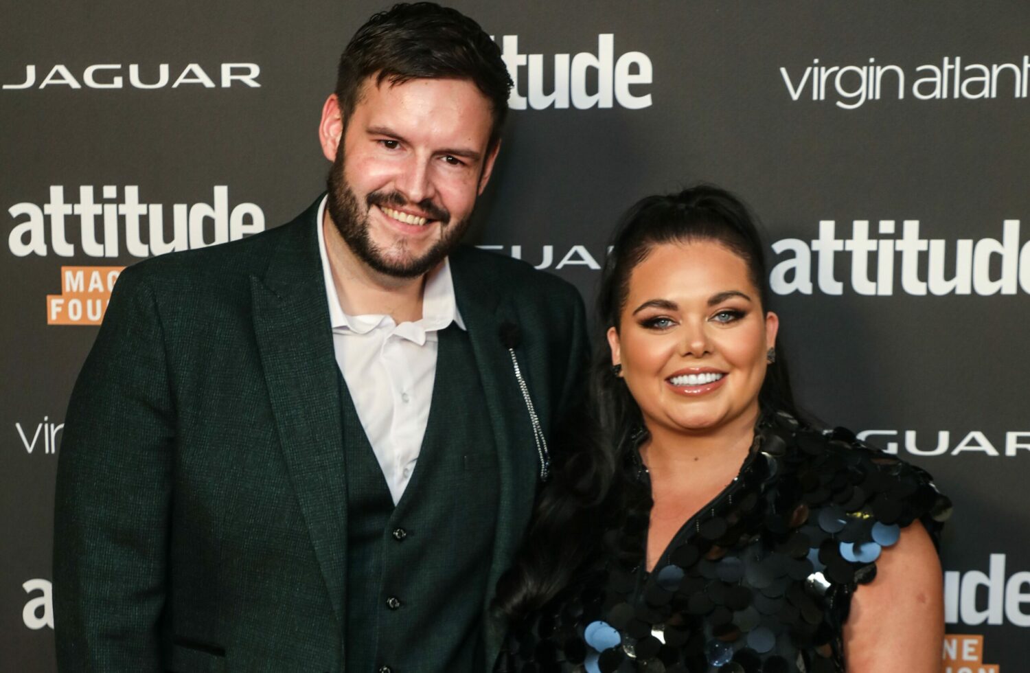 Scarlett Moffatt and Scott Dobinson smile on the red carpet at the Attitude Awards 2022