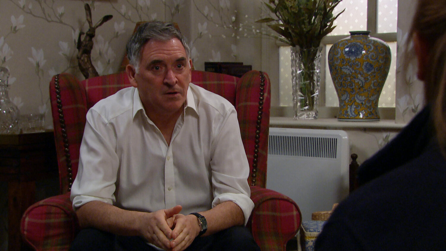 Bob in Emmerdale looks worried as he talks to Wendy and Manpreet