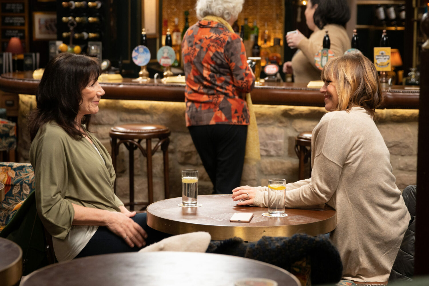 Emmerdale's Faye and Rhona are talking in The Woolpack