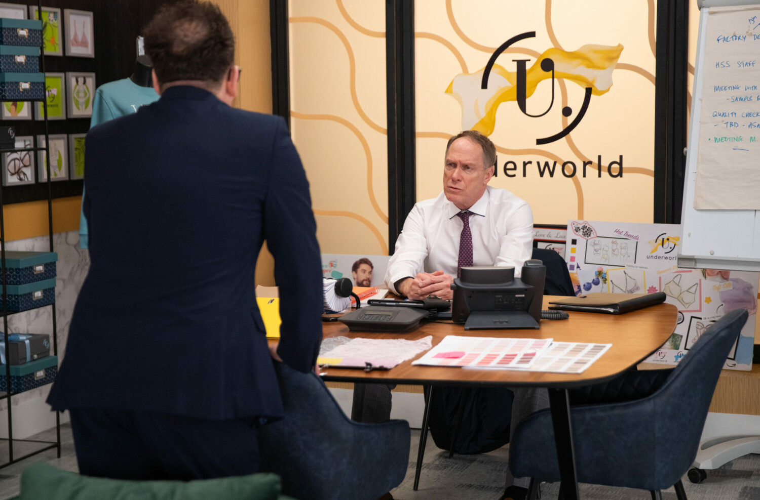 Stephen Reid looks concerned in the Underworld office as Rufus sits on the table