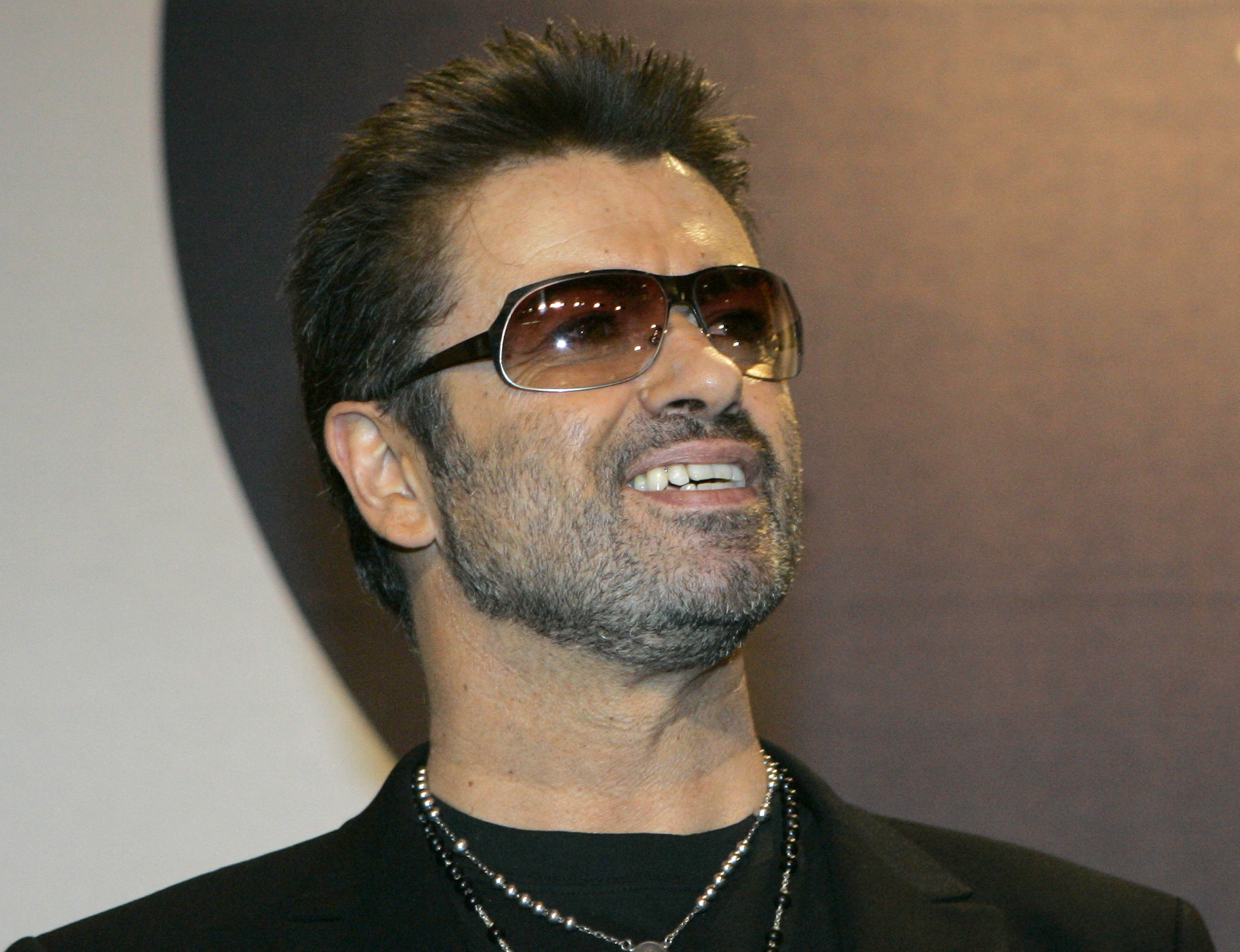 George Michael smiles in Germany in 2005