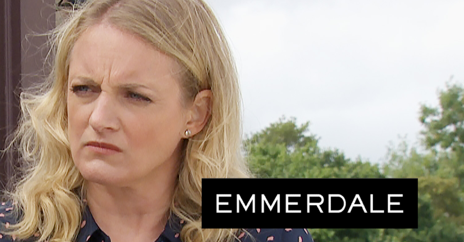 Emmerdale's Nicola is looking furious with the Emmerdale logo