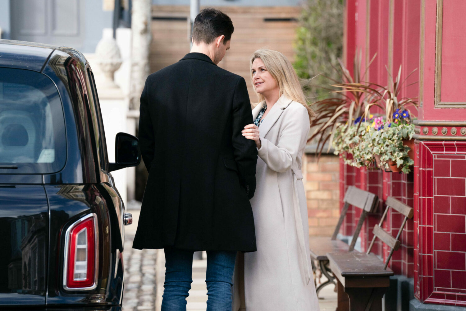 Zack and Sam talk outside on EastEnders