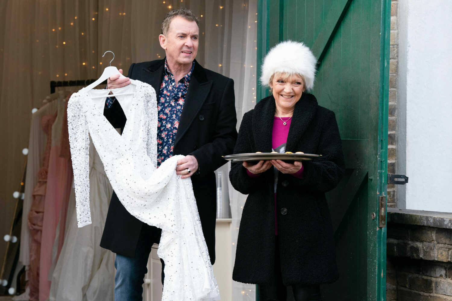 Alfie Moon and Jean Slater try to sell wedding dresses with a smile