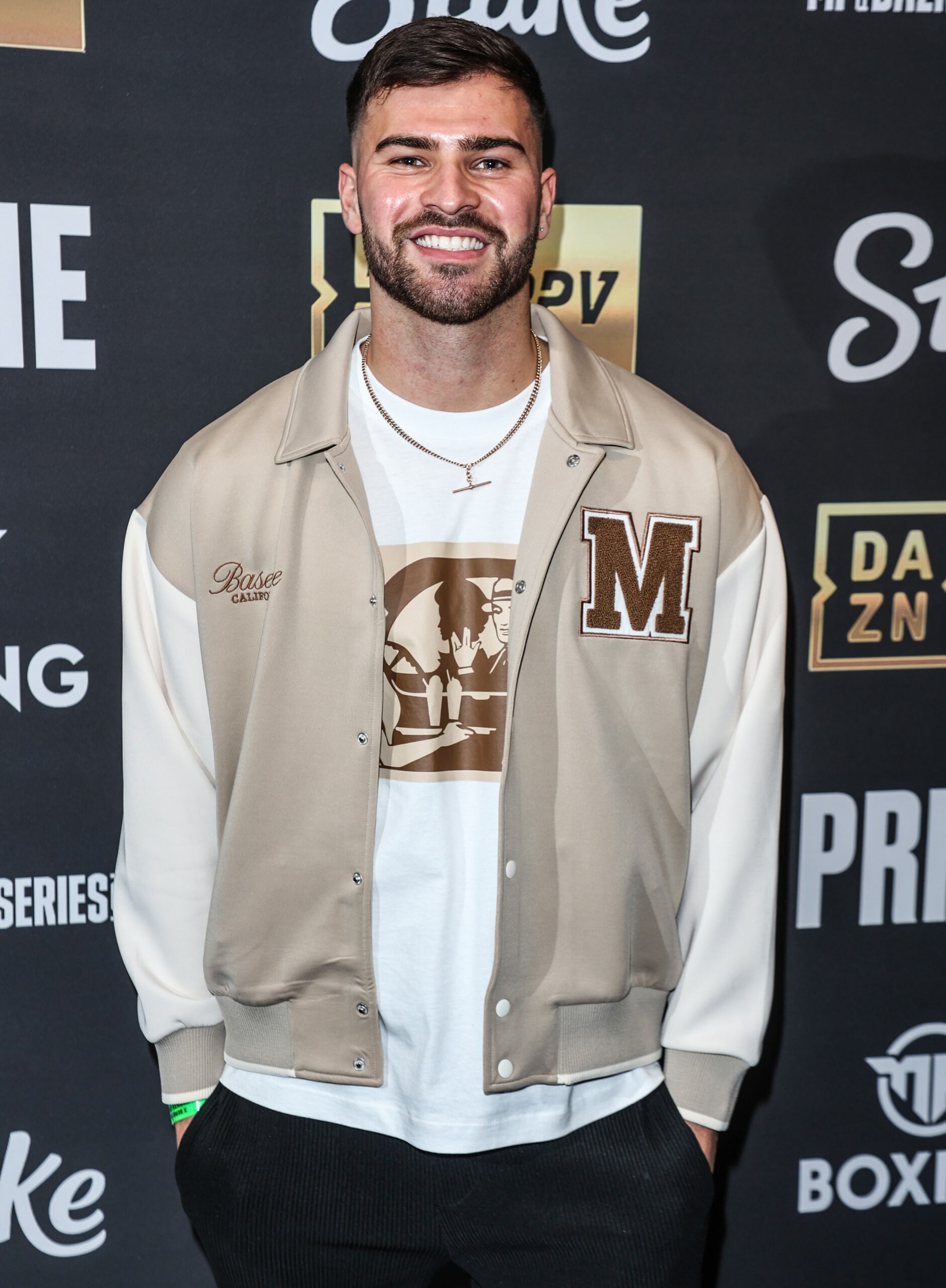 I'm A Celebrity star Owen Warner smiling at event