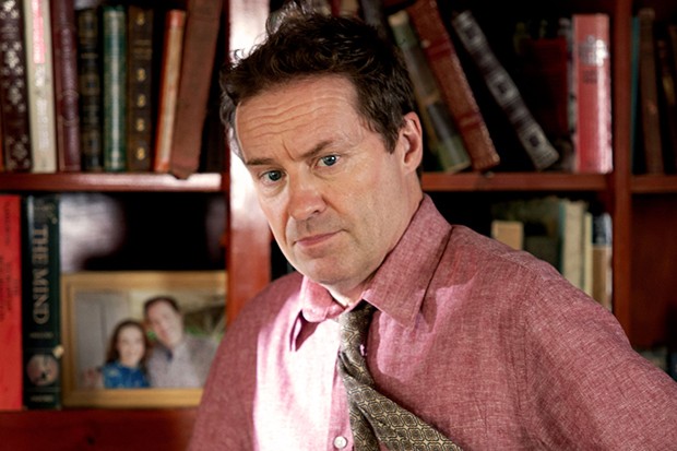 DI Mooney frowns in Death in Paradise