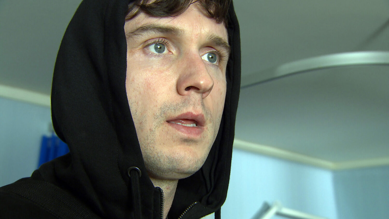 Alex in Emmerdale looks shifty with his hoody up