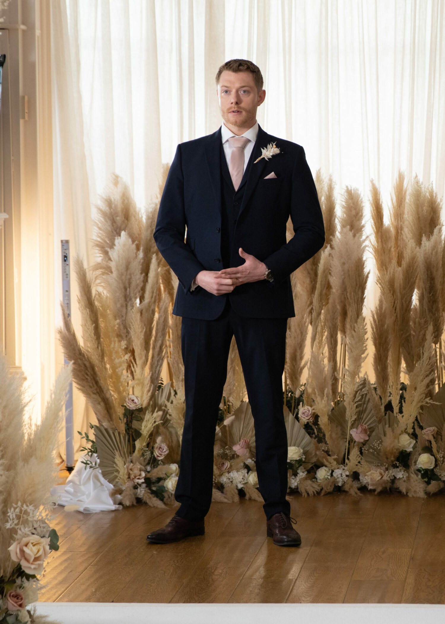 Daniel Osbourne waits nervously at the wedding venue