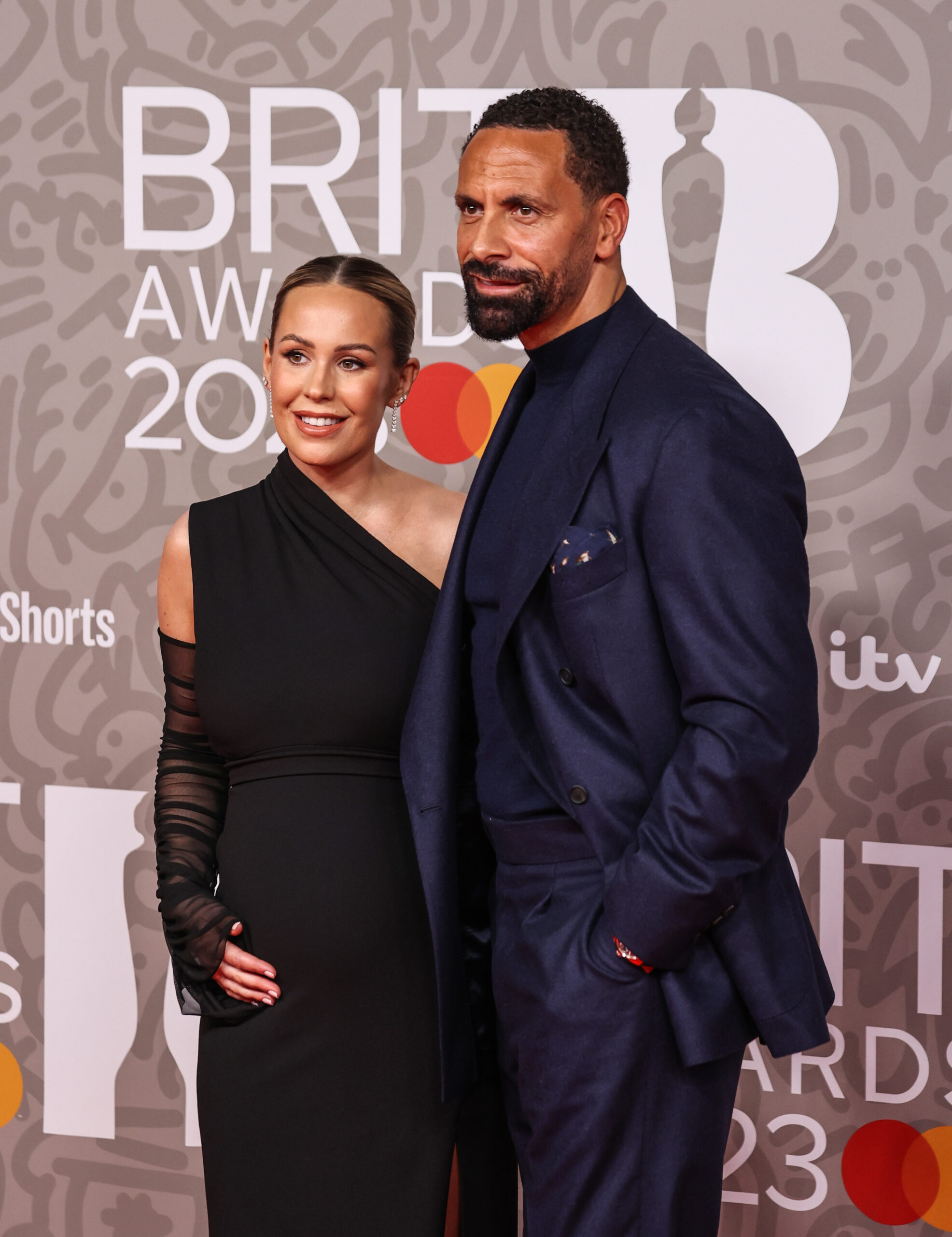 Kate and Rio Ferdinand smiling at BRIT Awards