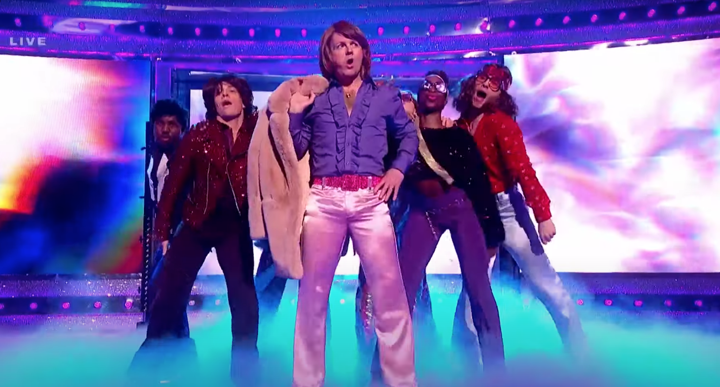 Dec Donnelly posing on Ant and Dec Saturday Night Takeaway