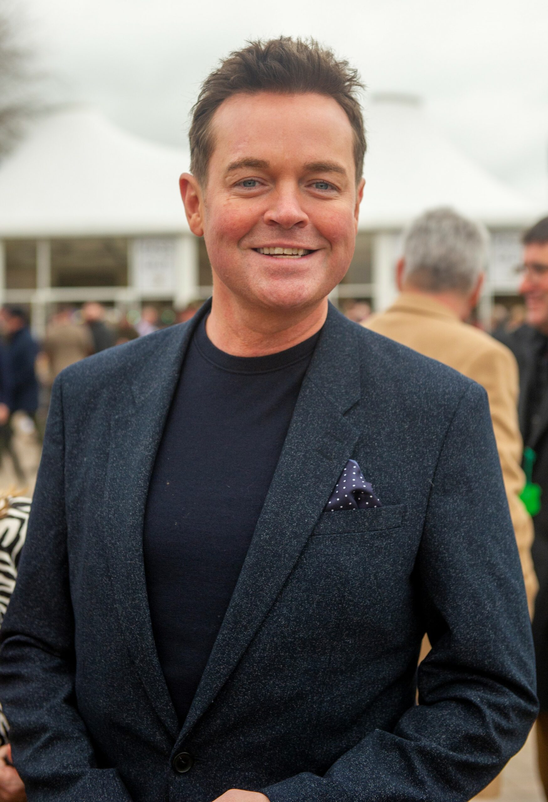 Stephen Mulhern smiling at Cheltenham races
