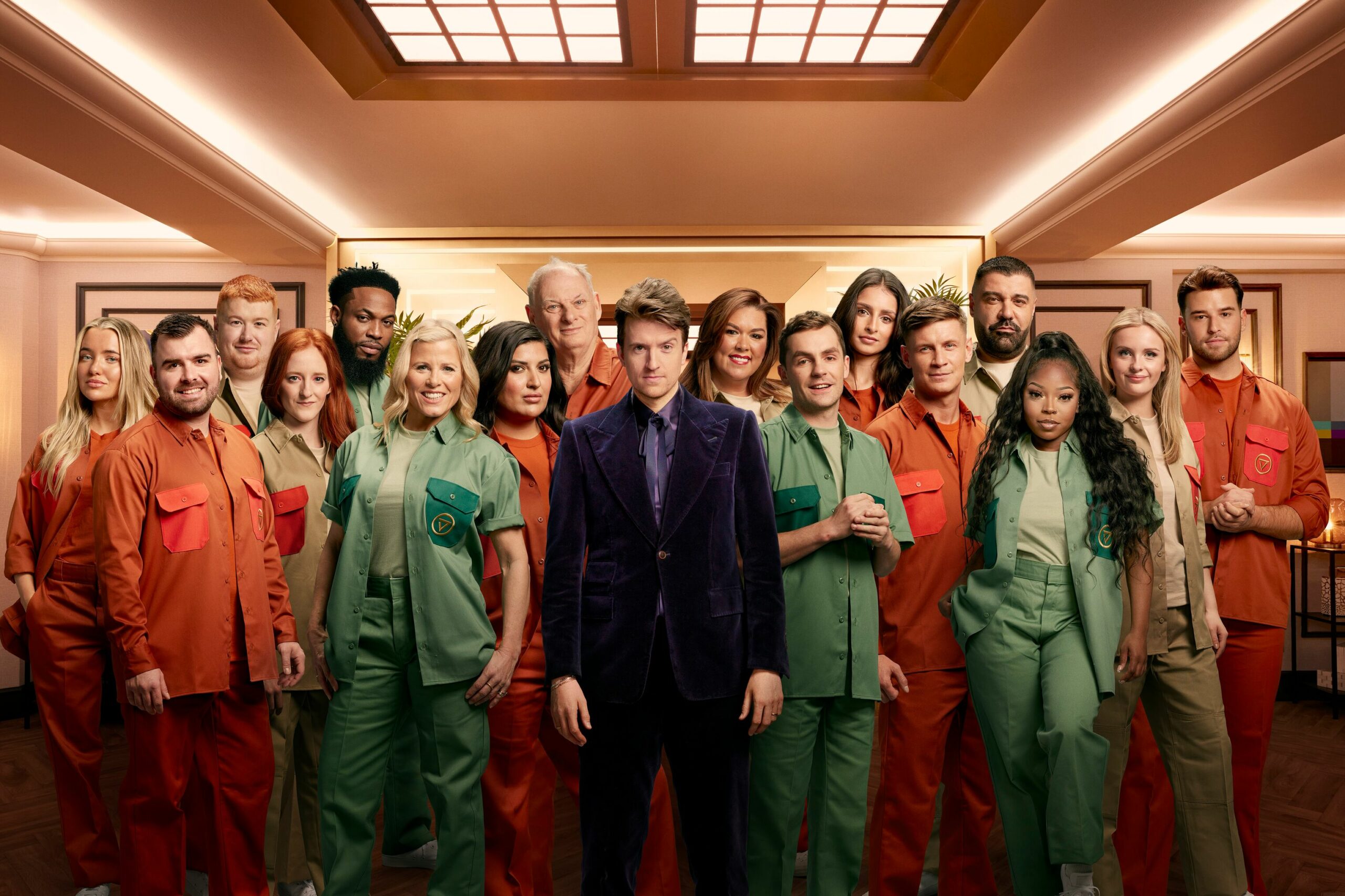 Greg James poses with Rise and Fall contestants