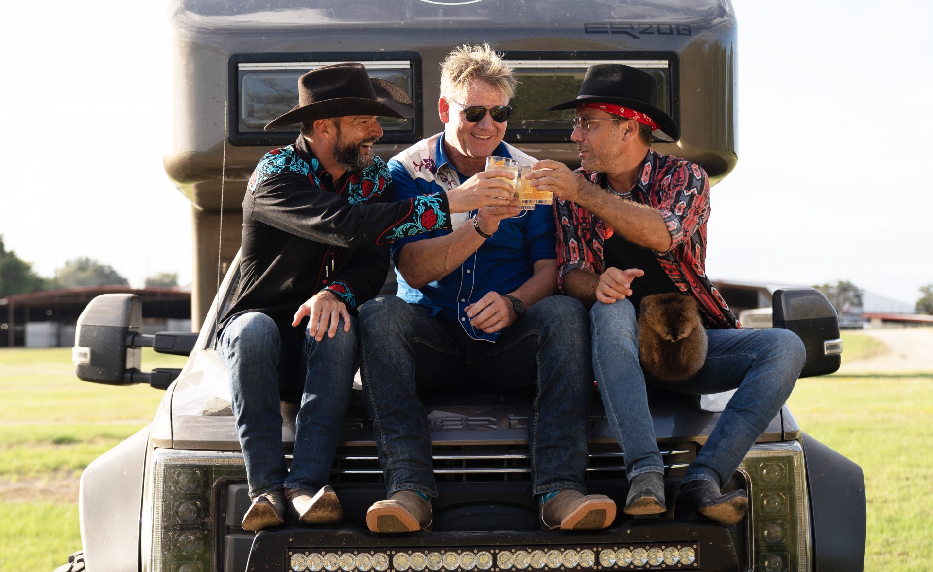 Gino, Gordon and Fred sitting on top of their motorhome in ITV show