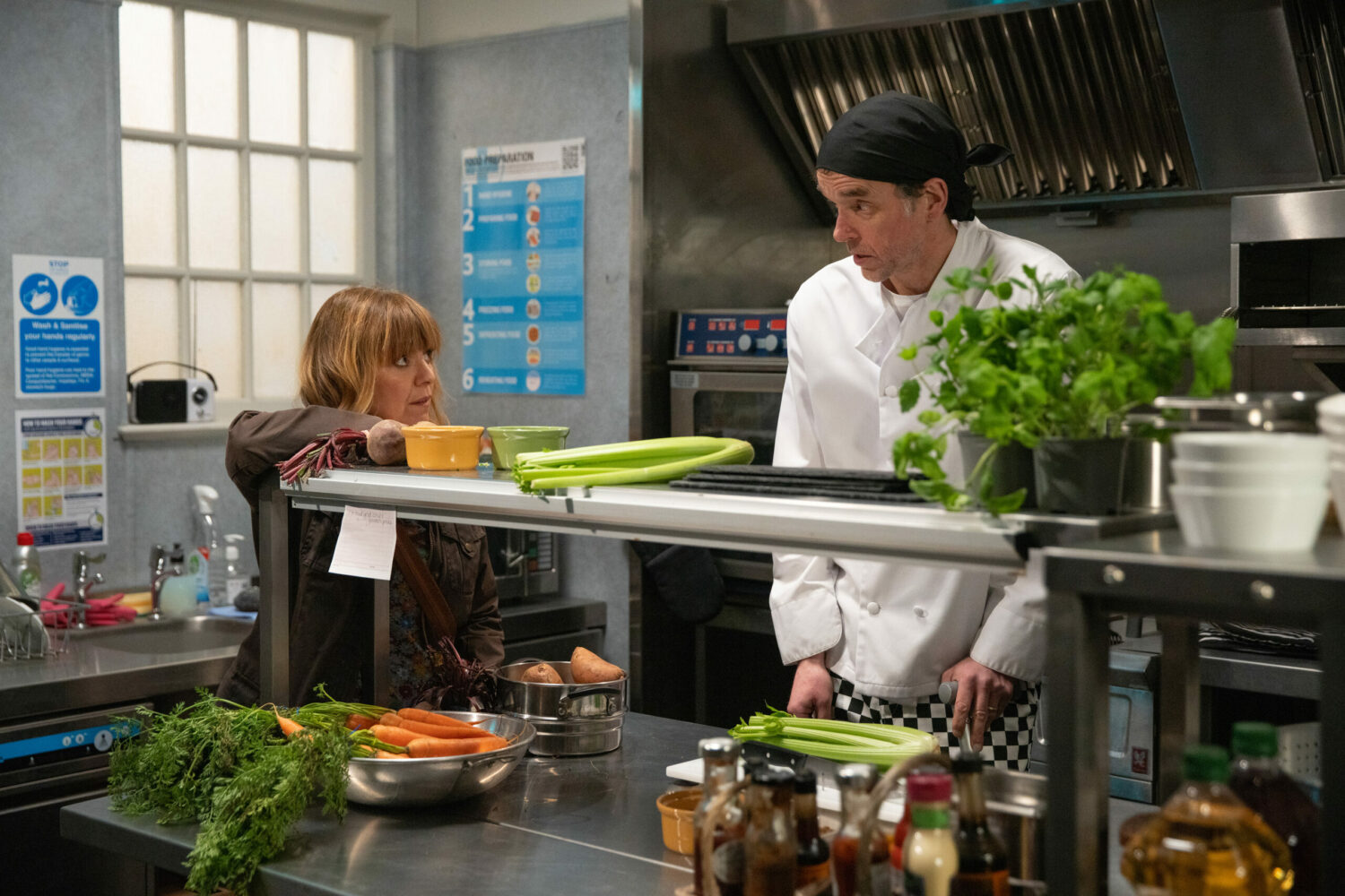 Rhona and Marlon in the Woolpack kitchen on Emmerdale