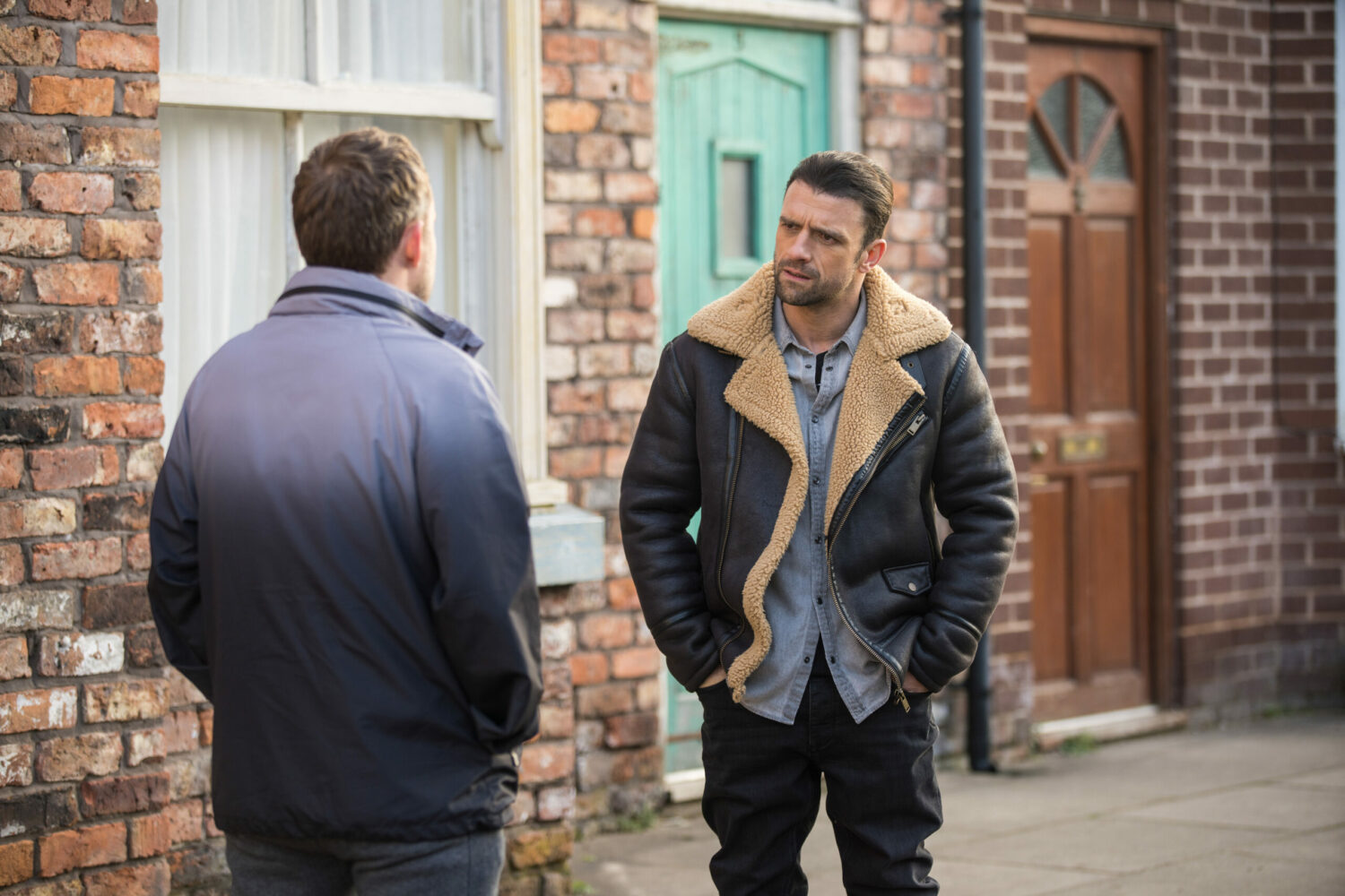 Damon in Coronation Street eyes up Paul suspiciously on the cobbles