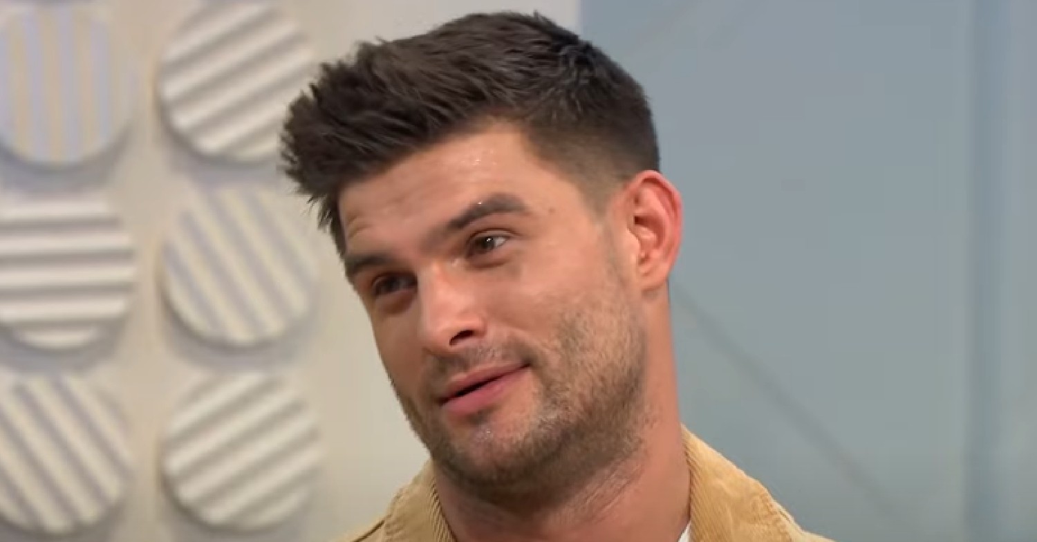 Strictly star Aljaz Skorjanec tilting his head on Lorraine