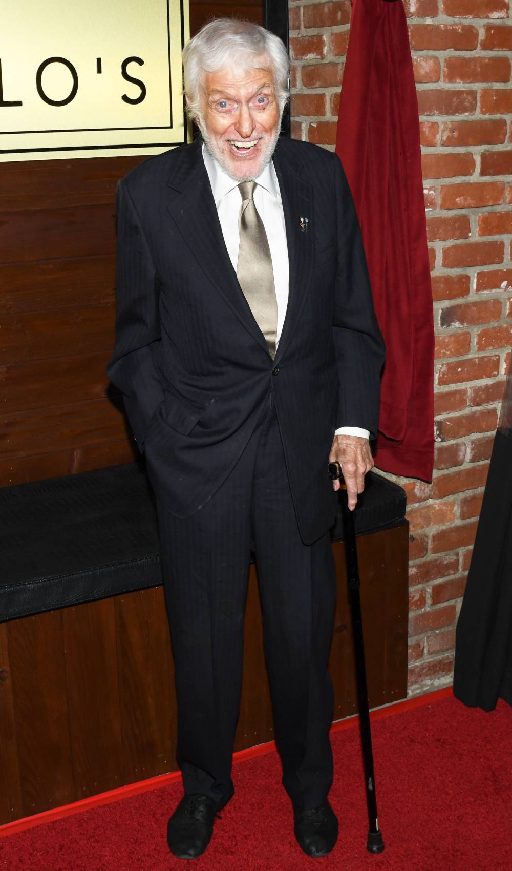 Dick Van Dyke smiles for the cameras in 2019