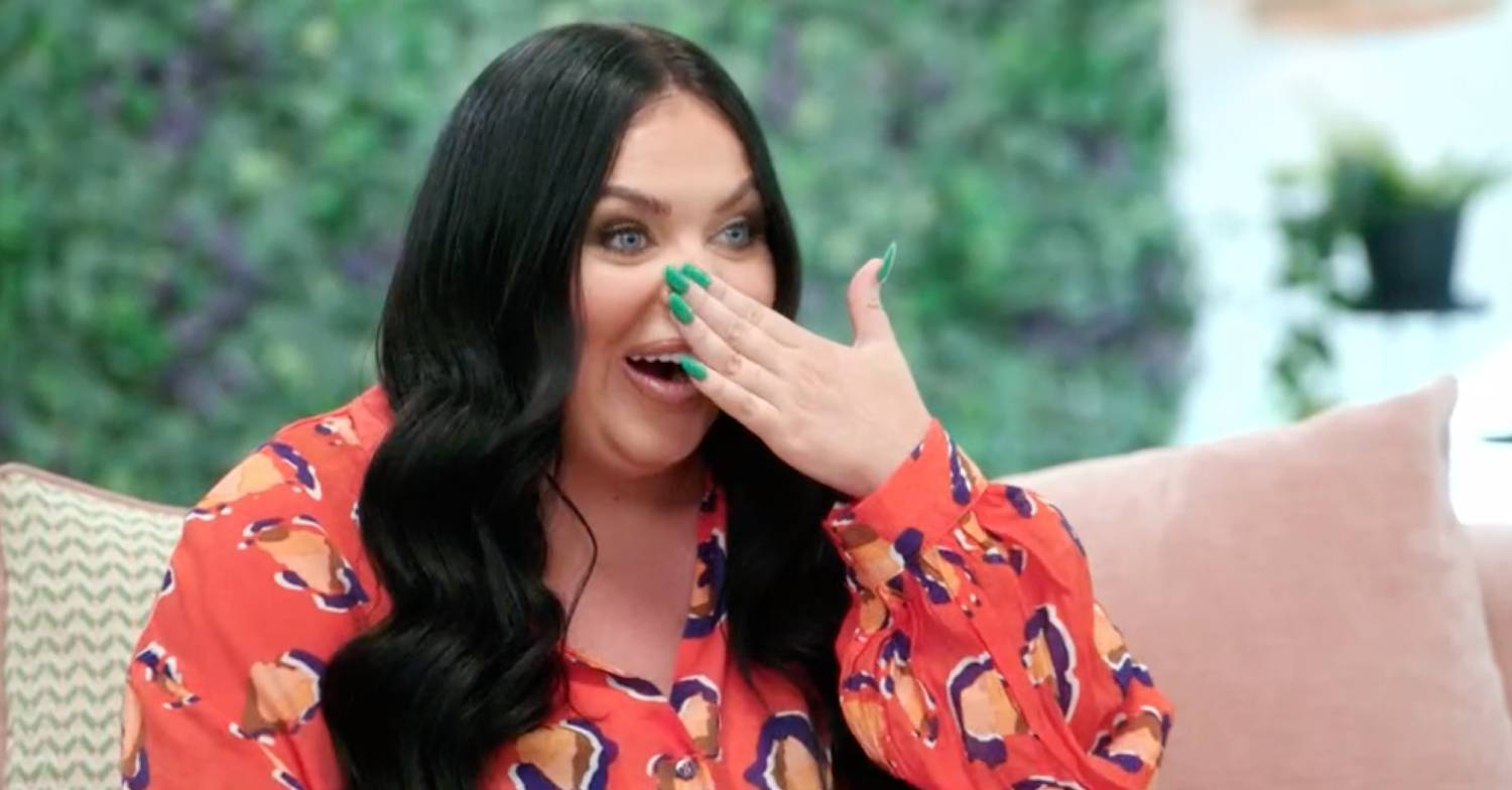 Scarlett Moffatt puts her hand over her face in surprise