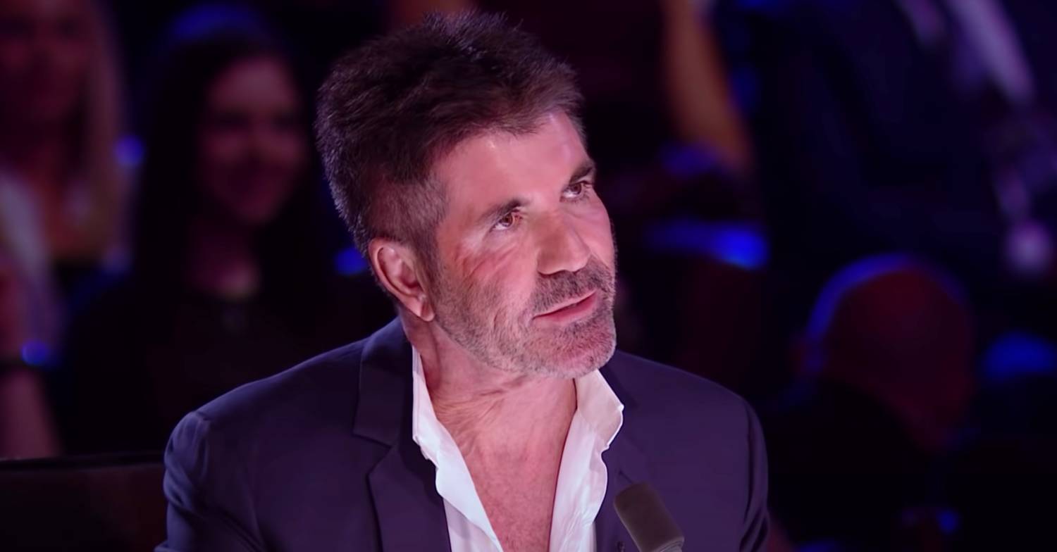 Simon Cowell speaks to a BGT contestant