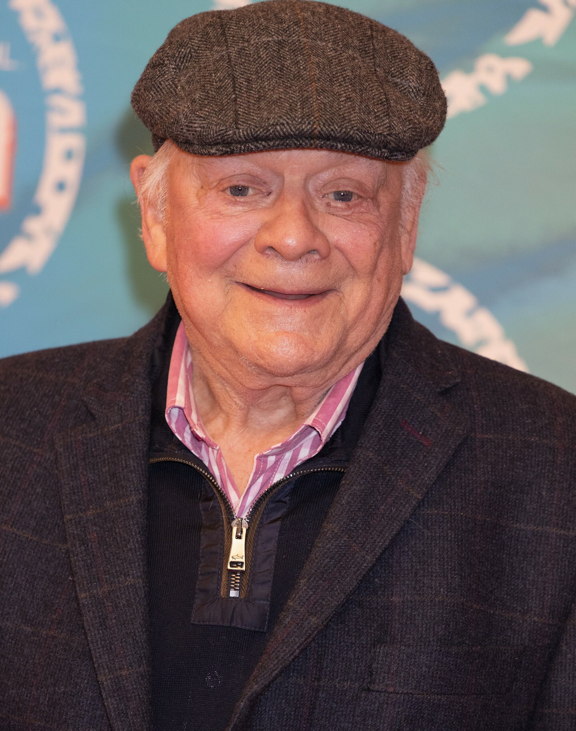 Sir David Jason smiling at event with hat on