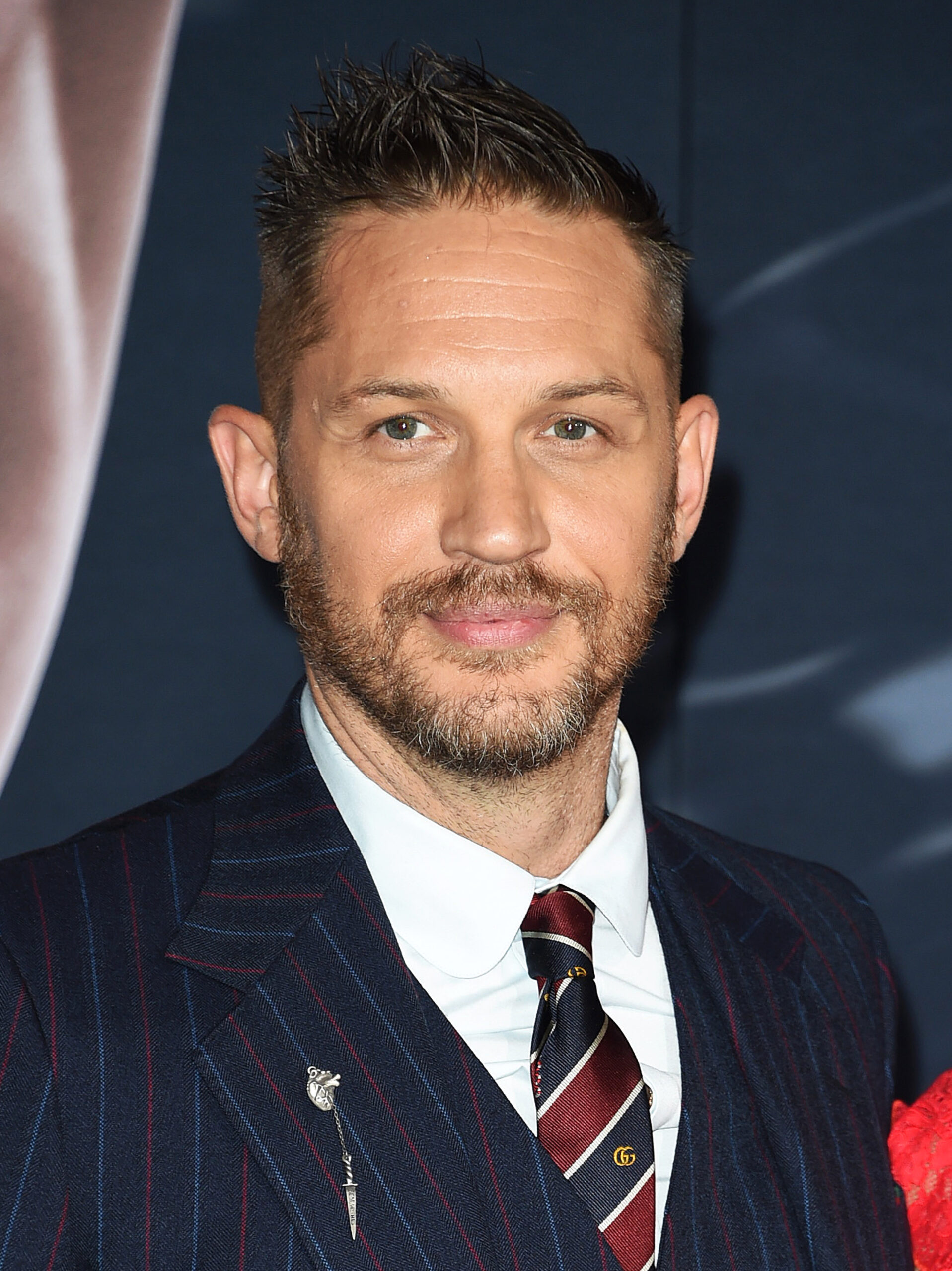 Tom Hardy smiling at the Venom premiere