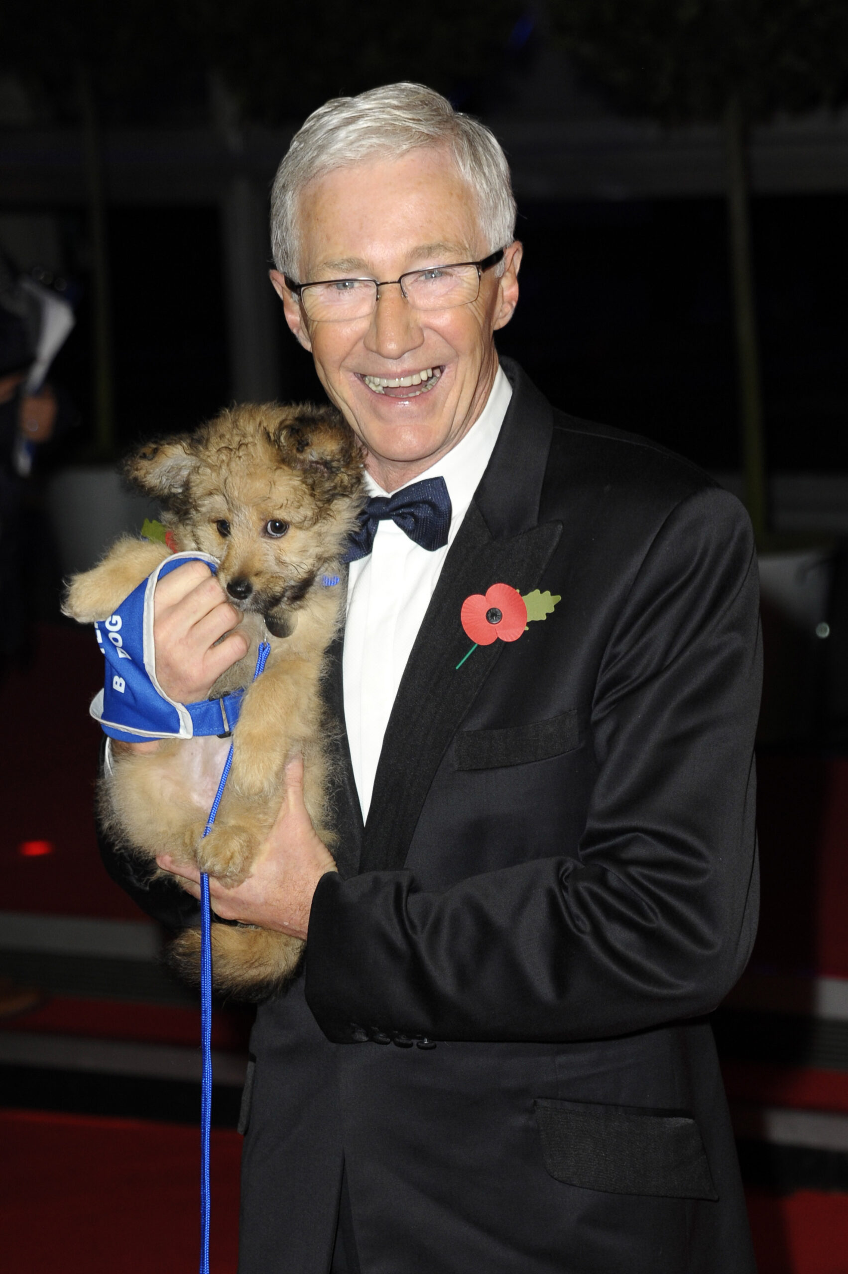 Paul O'Grady smiles at Battersea Dogs and Cats home Gala in 2014