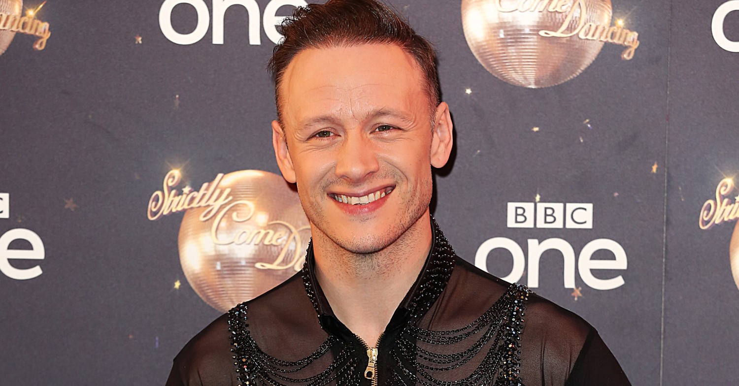 Kevin Clifton posing on the Strictly Come Dancing red carpet
