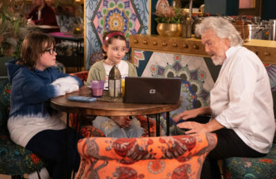 Stu, Eliza and Yasmeen sit and talk on Coronation Street