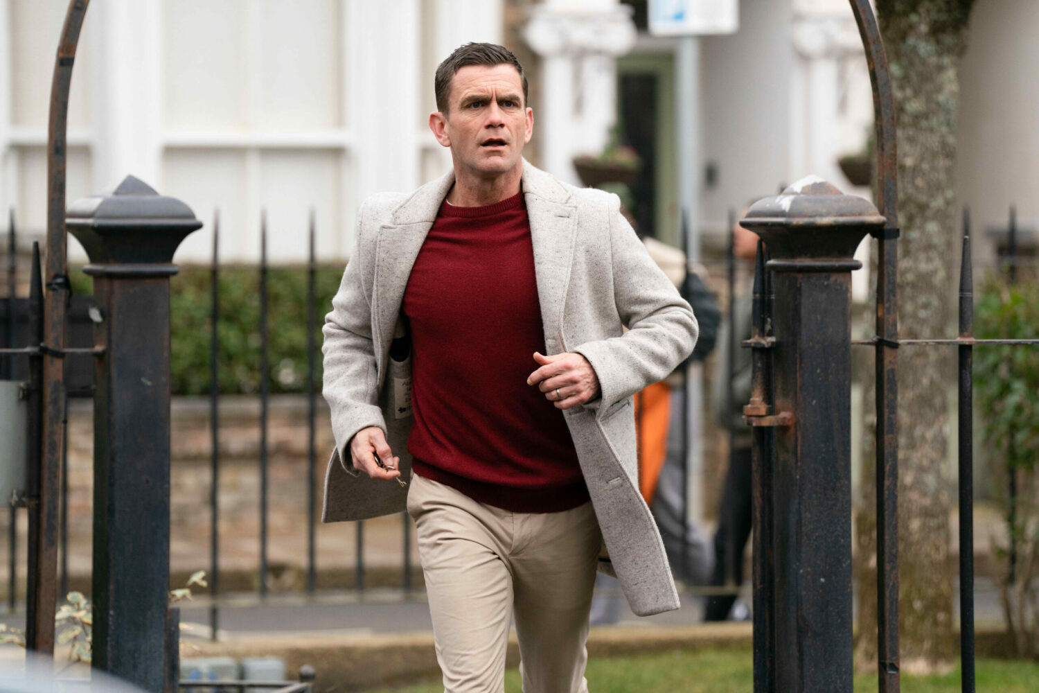 Jack Branning running through Albert Square