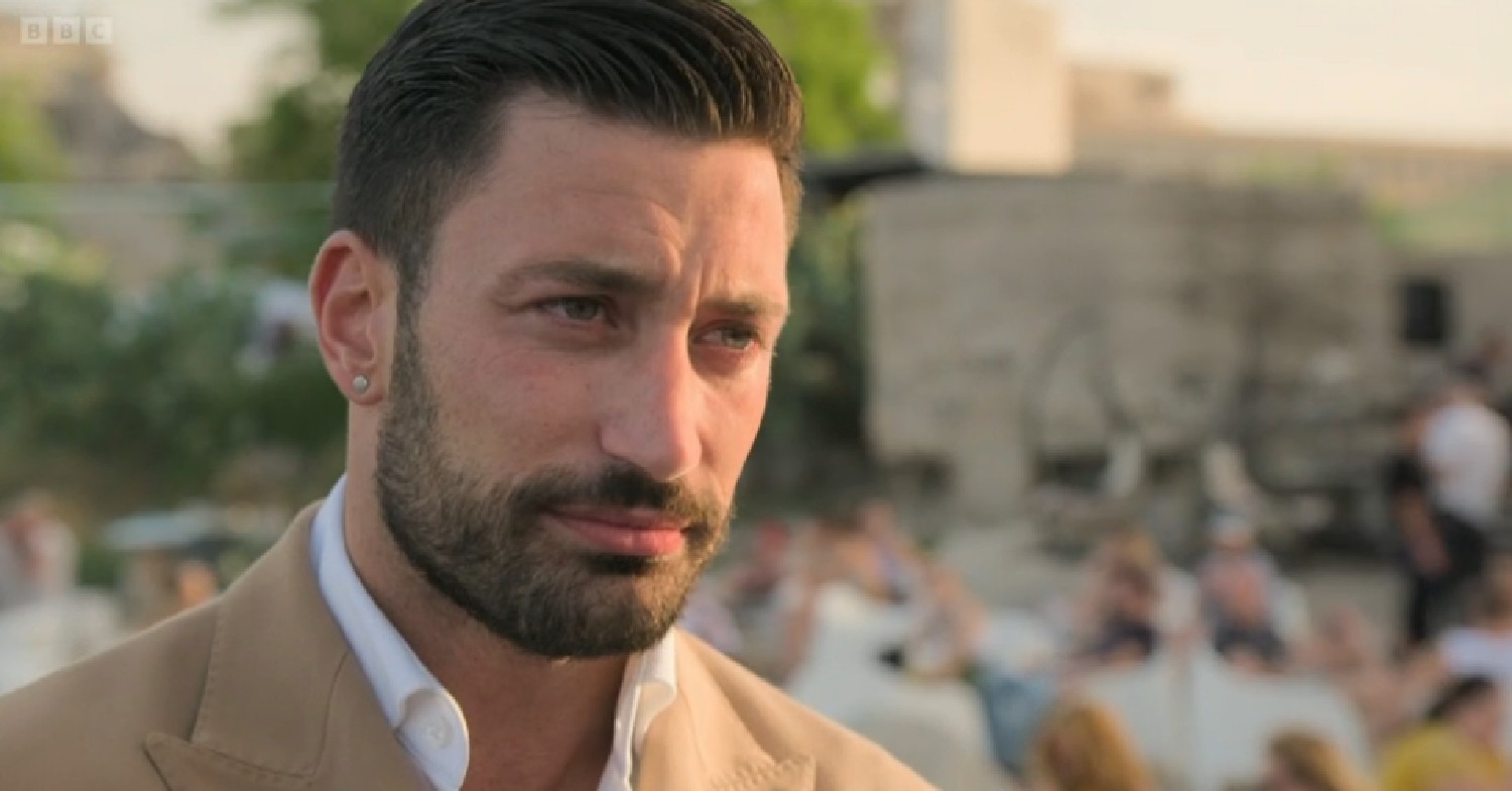 Giovanni Pernice speaking to camera on Sicily travel show