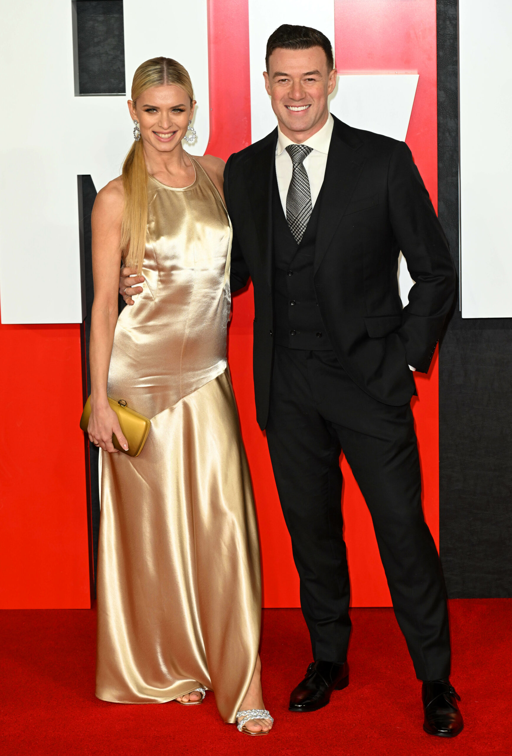 Nadiya and Kai smiling on the red carpet 