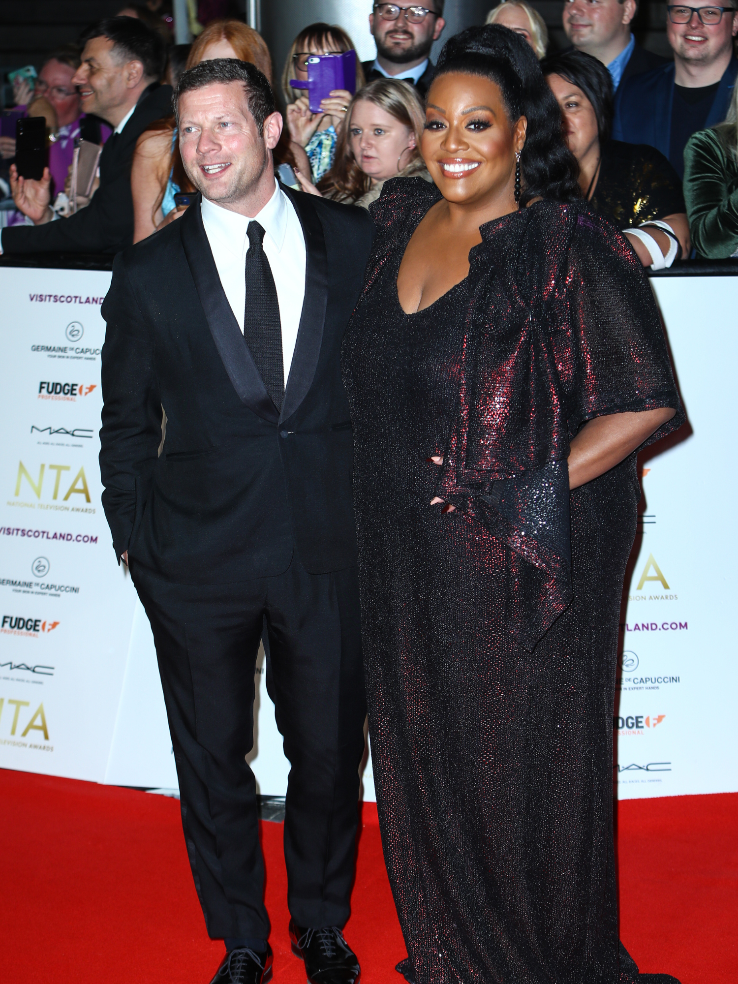 Dermot O'Leary and Alison Hammond on the red carpet smiling