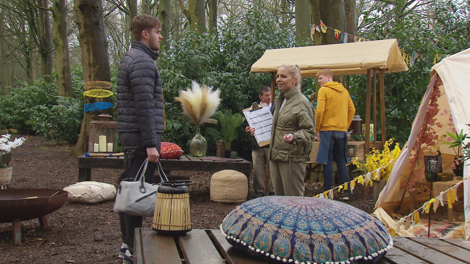 Tom and Belle talk happily outdoors on Emmerdale