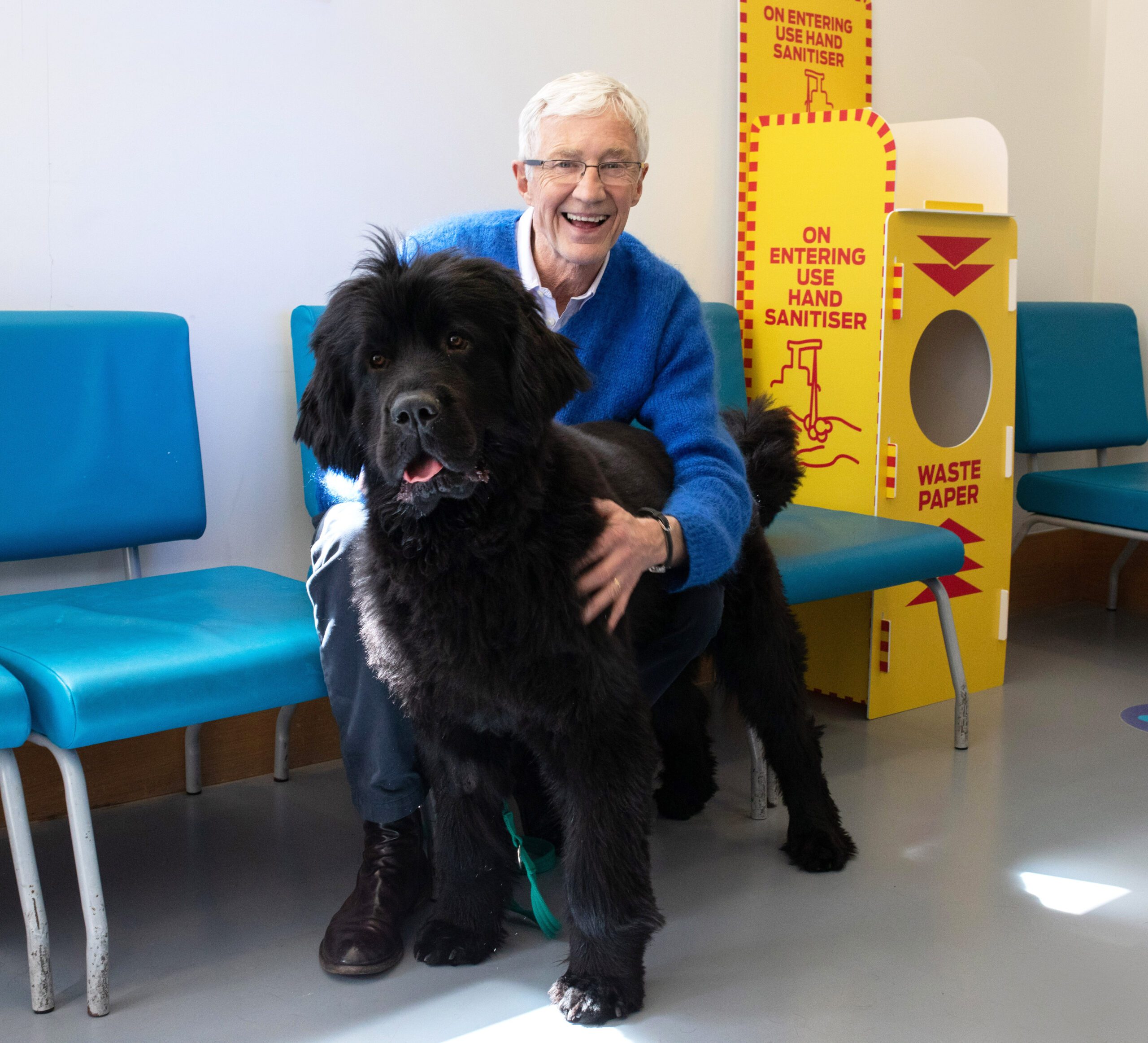 Paul O'Grady smiles with dog on For Love of Dogs
