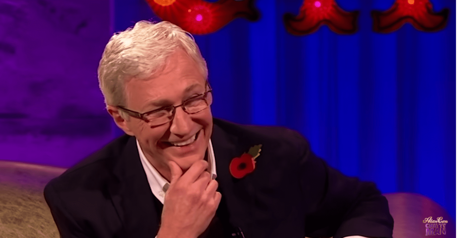 Paul O'Grady smiling on Alan Carr's TV show