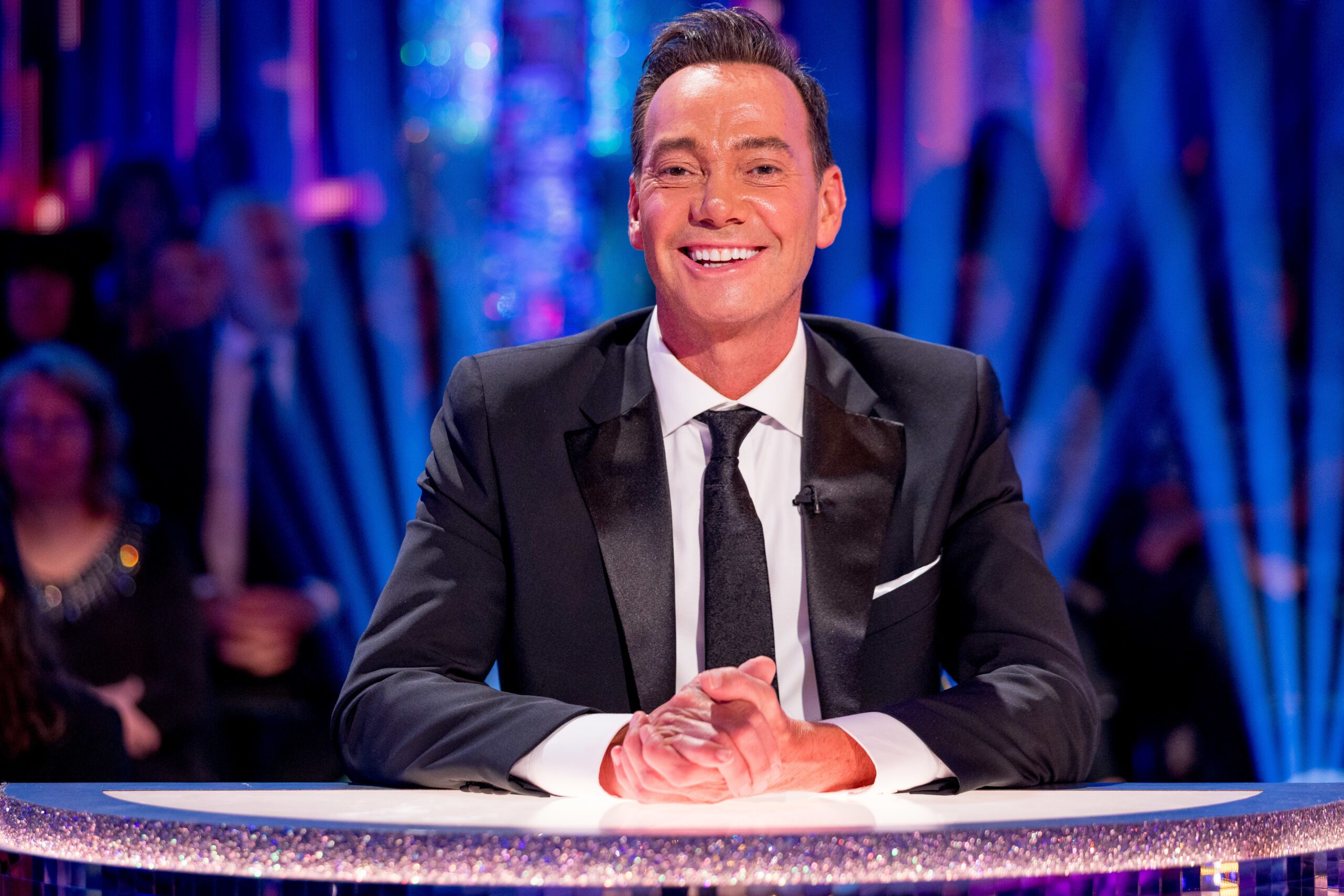 Craig Revel Horwood smiles on Strictly