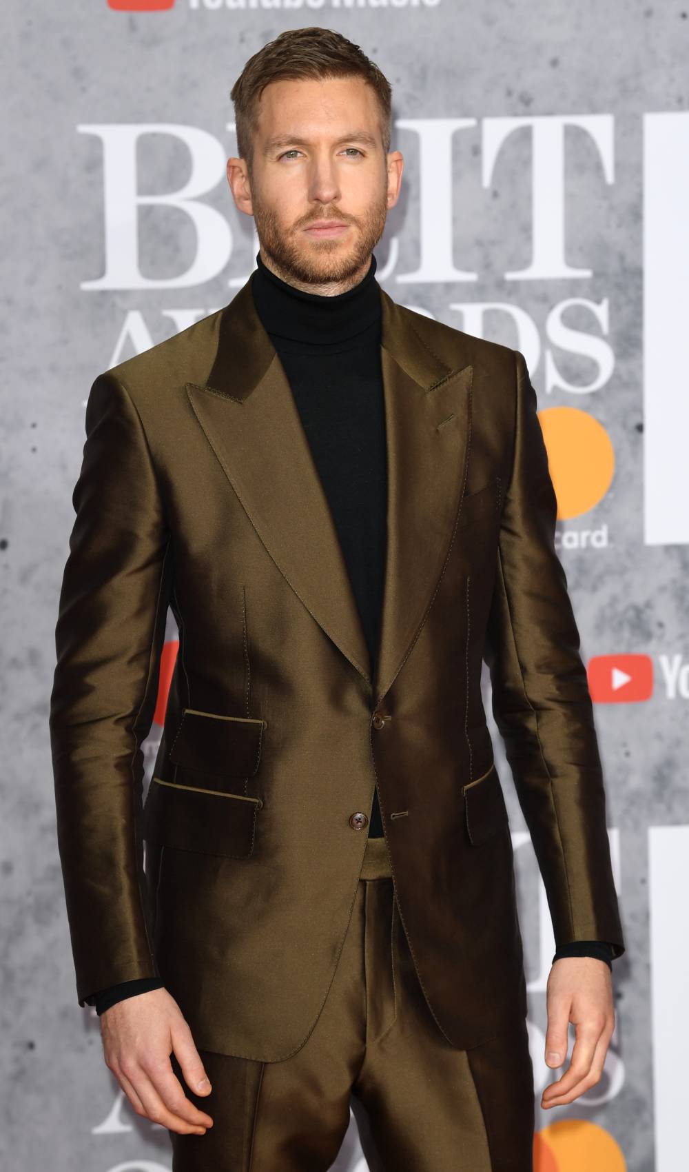 Calvin Harris poses at the BRITs 