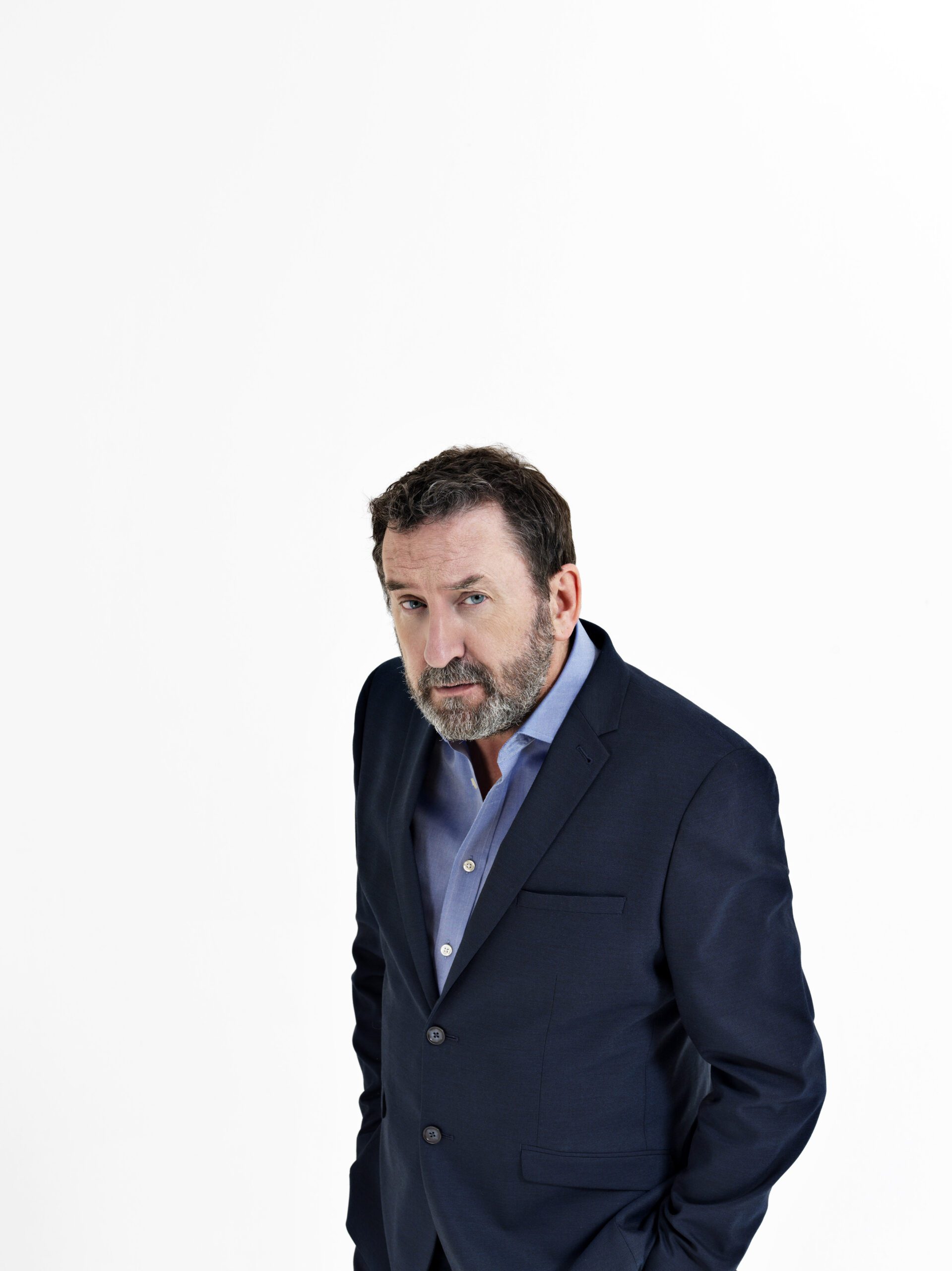 Lee Mack looks shifty in promo shot for The 1% Club