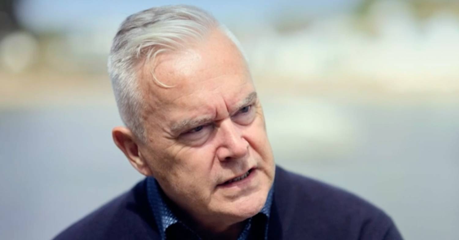 Huw Edwards looks serious