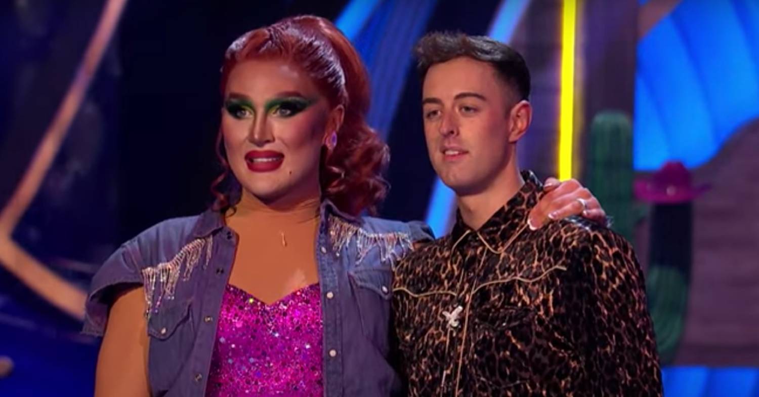 The Vivienne stands alongside Dancing On Ice skating partner Colin Grafton