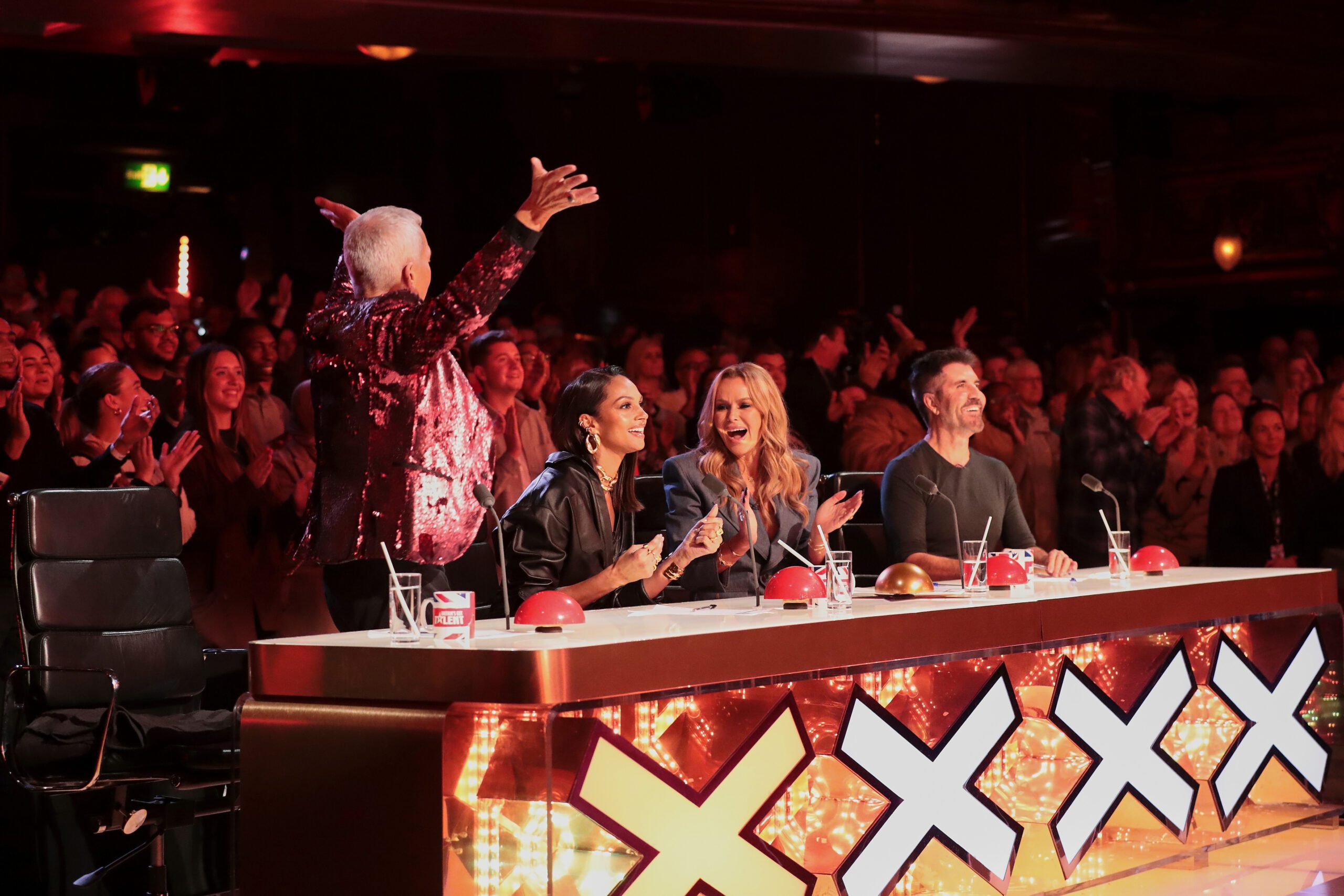 Bruno waves his arms in the air as the judges laugh on BGT