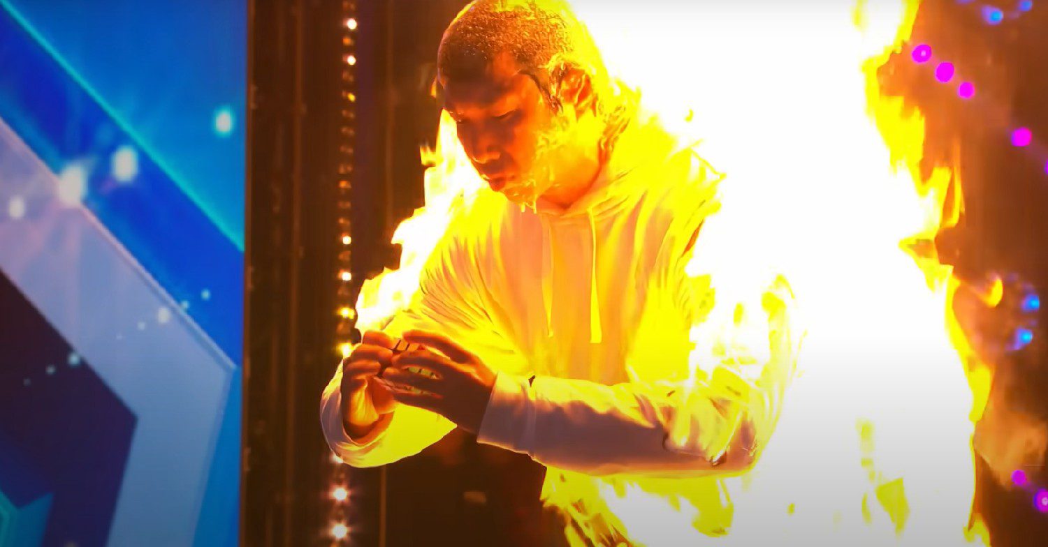 Thomas Vu solving a Rubik's Cube while on fire