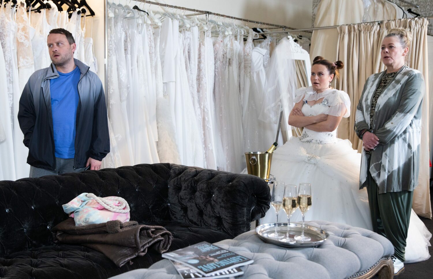 Paul, Gemma and Bernie in Coronation Street all look shocked in the wedding dress shop