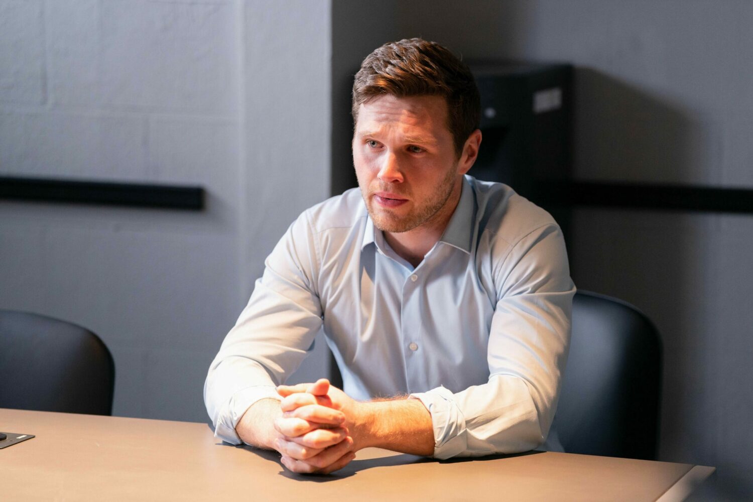 EastEnders spoilers: Keanu looks worried as he clasps his hands together in the police interview room